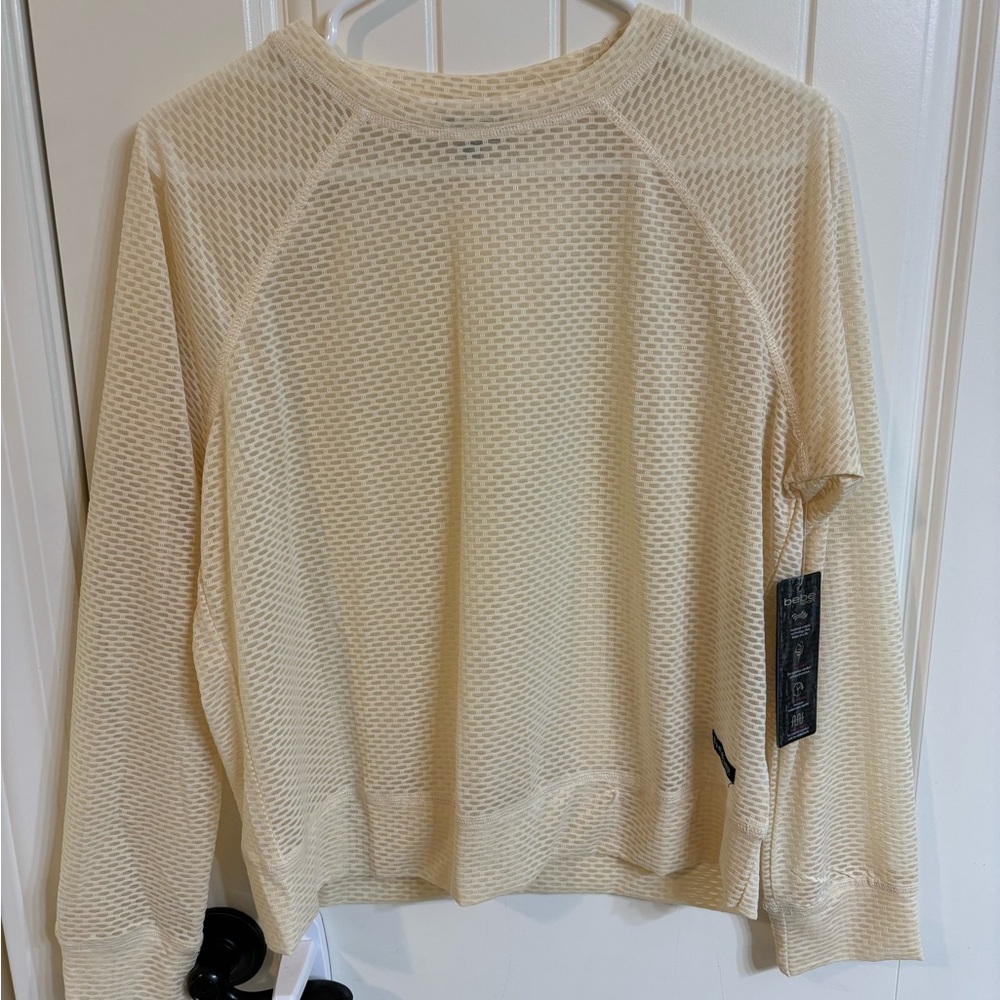 Long sleeve Bebe netted top.